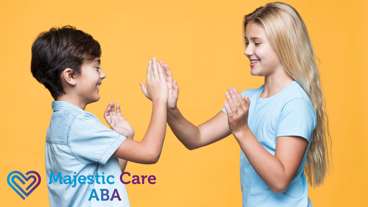 Children engaging in ABA therapy, practicing social skills through friendly conversation and positive interaction.